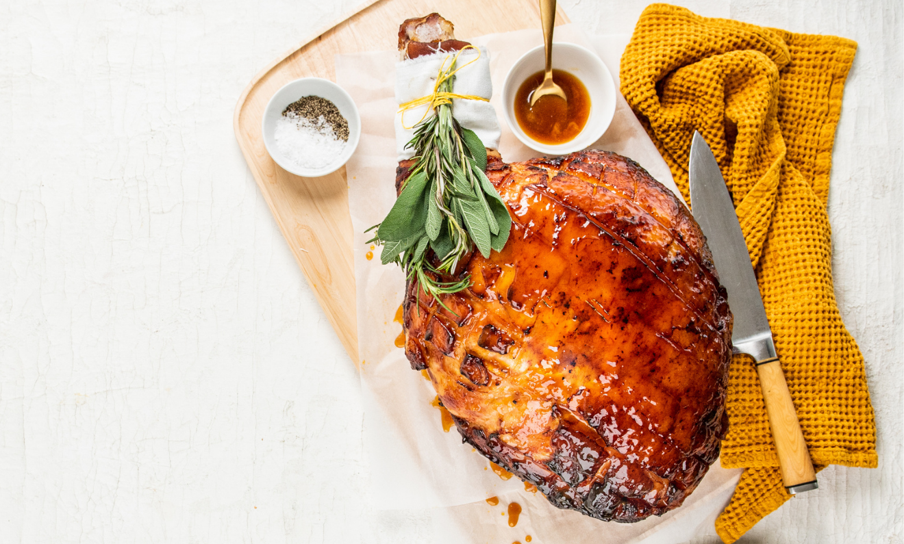 https://capilanohoney.com/wp-content/uploads/2021/11/Spiced-Honey-and-Orange-Glazed-Ham.png